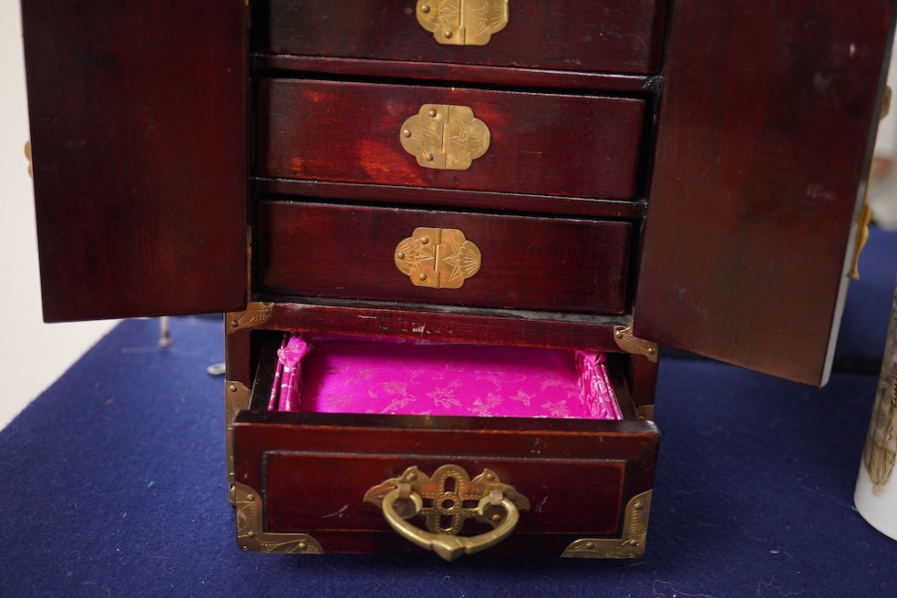 A Chinese brass mounted jewellery cabinet, decorated with enamel plaques. 21cm high. Condition - generally good
